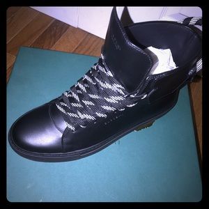 Buscemi Brand new runs small perfect for a size 10